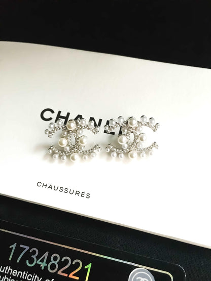 Authentic Chanel Pearl Stud Earrings - Tracesilver